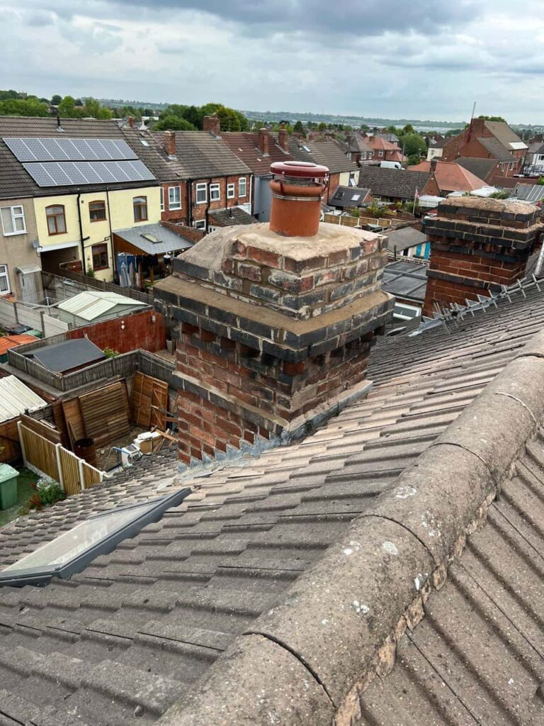 This is a photo taken from a roof which is being repaired by Branston Roofing Repairs, it shows a street of houses, and their roofs